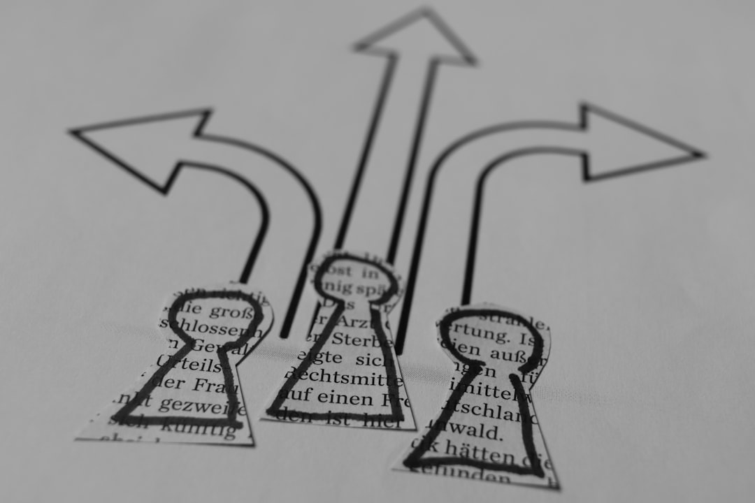 a close up of a piece of paper with arrows